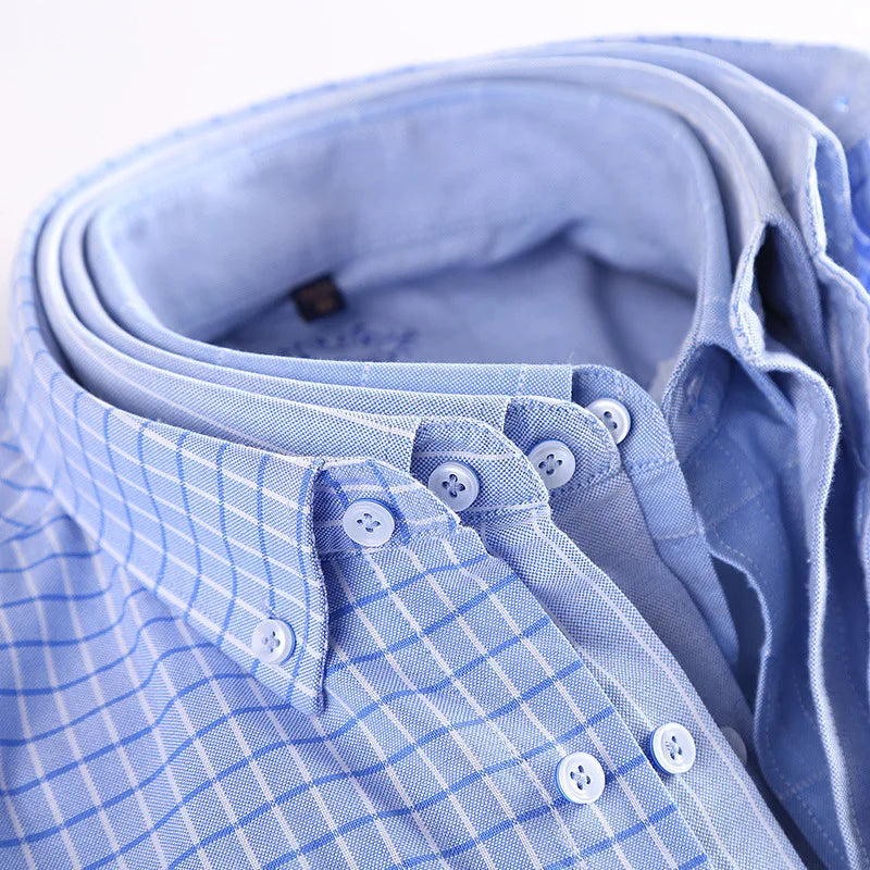 Light blue Oxford shirt, collar and button detail