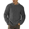 Man wearing the charcoal grey Highland cable-knit crewneck sweater